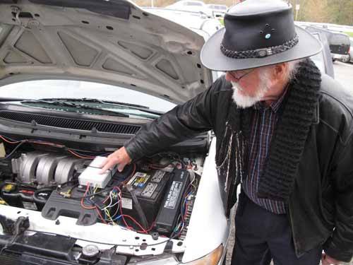 James Beene of Mileage Maxer points out his installed Wizard Unit.
