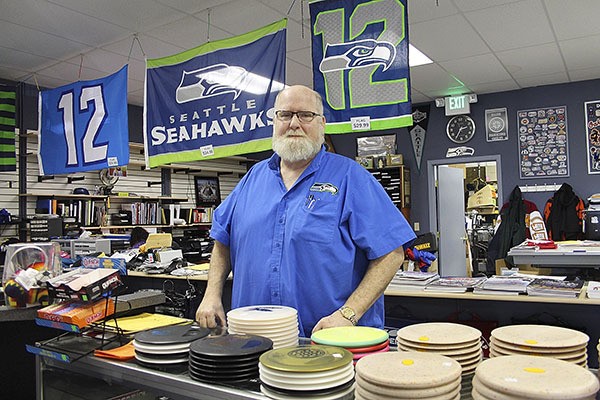 Ralph Rogers has been the face behind the counter and the business at Team Sports in Bremerton for years. He’ll close his business at the end of the month after declining sales due to online competition.