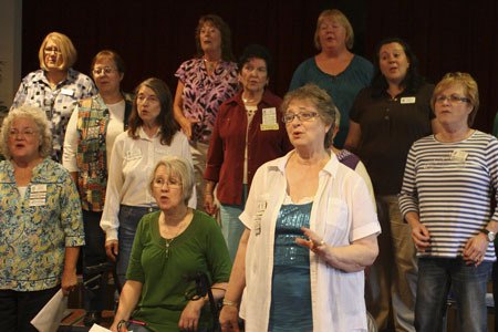 Members of an all-female barbershop chorus