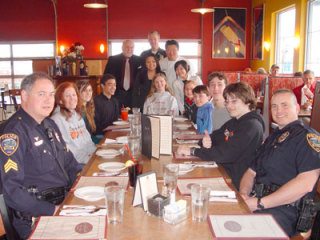 A group of Cedar Heights Junior High School students were treated to lunch last month for being ‘Model Citizens.’ Pictured from left to right are POPD Sgt. Dale Schuster