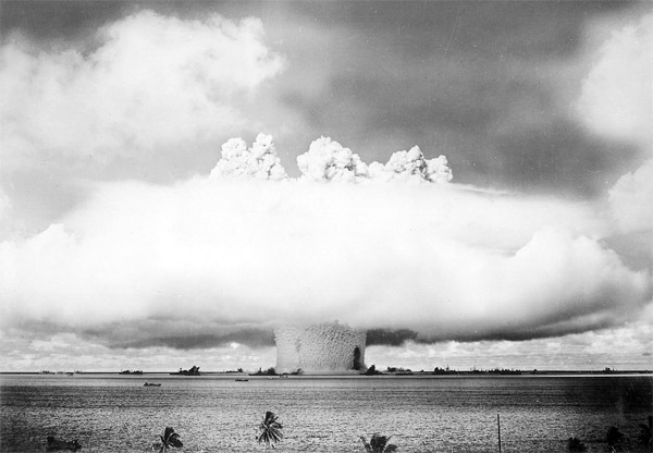 An atomic bomb detonates during the “Baker” nuclear test off the beaches of Bikini Atoll in 1946.