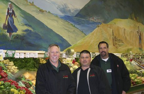 Poulsbo Red Apple Market owners (from left) Glyn Correll