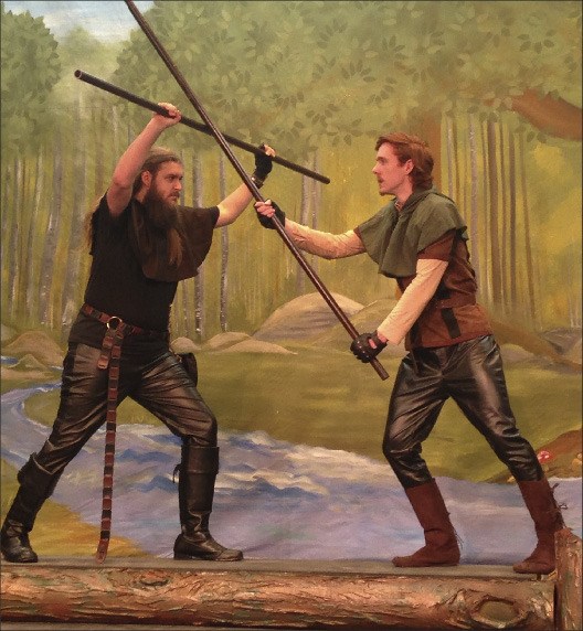 Robin Hood fights little john in the retelling of the legend by the Port Gamble Theater Company.