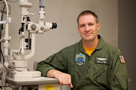 Lt. Cmdr. Tyler Miles while working as an aerospace optometrist at the Naval Aerospace Medical Institute in Pensacola