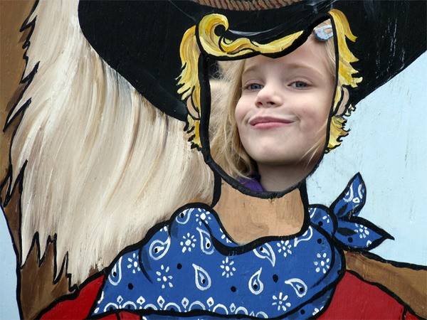 Seven-year-old Rayana Neary is transformed into a cowgirl at Corey’s Day on the Farm on Monday.