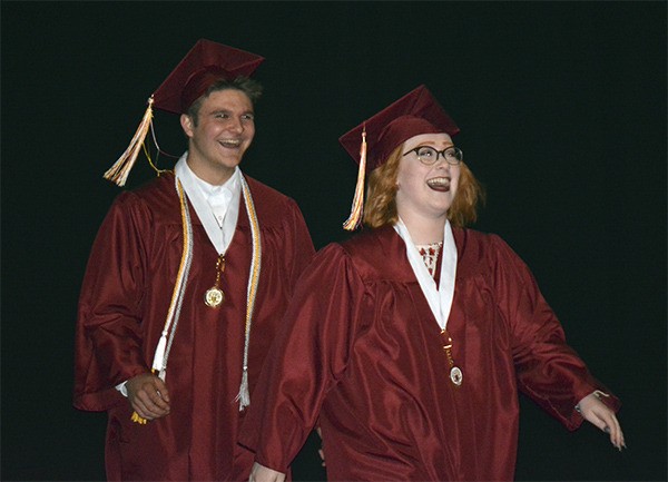 South Kitsap High School graduates Alec Matala (left) and Kylee Lowery show their excitement as the Class of 2016 lines up to receive their diplomas. They took part in the school’s graduation ceremony June 14 at the Tacoma Dome.