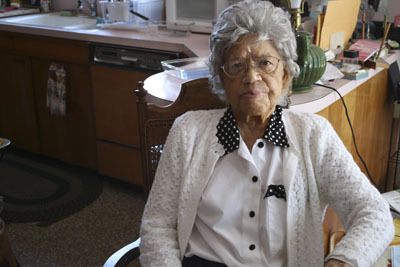Local civil rights activist Lilian Walker sits at her kitchen table in the home she and her husband James bought in a predominately white neighborhood in 1943. With the opening of the Washington D.C. memorial to Dr. Martin Luther King Jr.