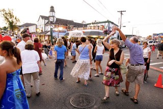 Front Street was hopping with celebrants during the Poulsbo Centennial’s street party on Saturday. Live entertainment supplied the tunes from a balcony at the intersection of Front Street and Jensen Way.