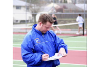 Bremerton boys basketball coach Casey Lindberg is coaching the BHS girls tennis team for the first time. He’s been on the job for less than 10 days.