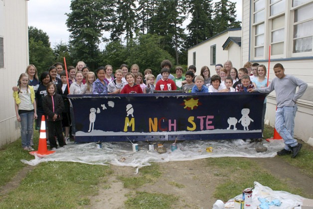 Sixth-grade students in Ann Giantvalley and Nancy Immel’s class recently painted the blade on a snow plow for Kitsap County Public Works.