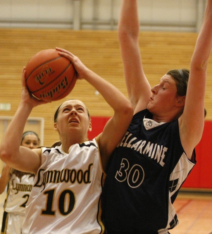 Claire Martin (30) defends a shot from a Lynnwood player.