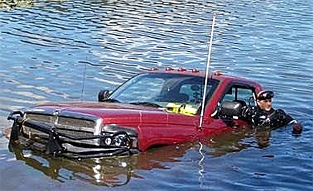 Corporal Polonsky volunteered his specialized skills and personal scuba gear to help “hook the Ram” and get a truck out of the water after it floated out into Kitsap Lake.