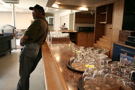Daryl Casson leans against the now-closed bar at Bremerton's American Legion Post 68.
