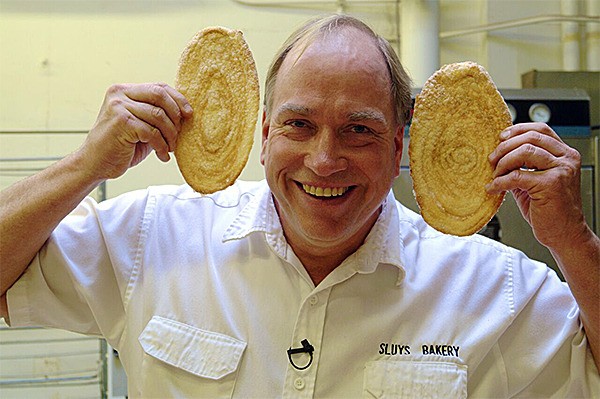 Owner Dan Sluys showcases one of the many pastries that Sluys Bakery makes by hand on “A Few Great Bakeries.”