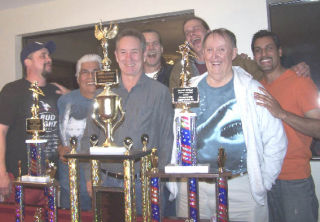 Kingston’s Drifters 2 pool team is the first-place champion of the North Kitsap 8-Ball Pool League. From left to right are Jeff Snow