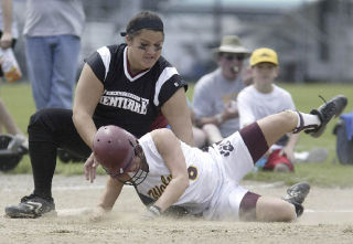 South Kitsap’s Shiloah Soete Riedel is tagged out at third base to snuff out a scoring opportunity against Kentlake.