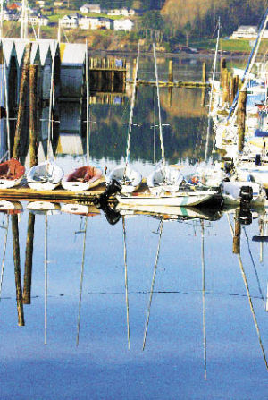 Fair weather brought out a mirror finish on Libery Bay recently. Temperatures are forecast to hit the low 70s today.