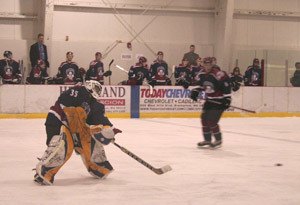 Puget Sound goalie Cameron Clemenson fires the puck back into play in Fridays narrow 2-1 loss to the Tri-City Titans. Clemenson saved 34 shots in the loss.