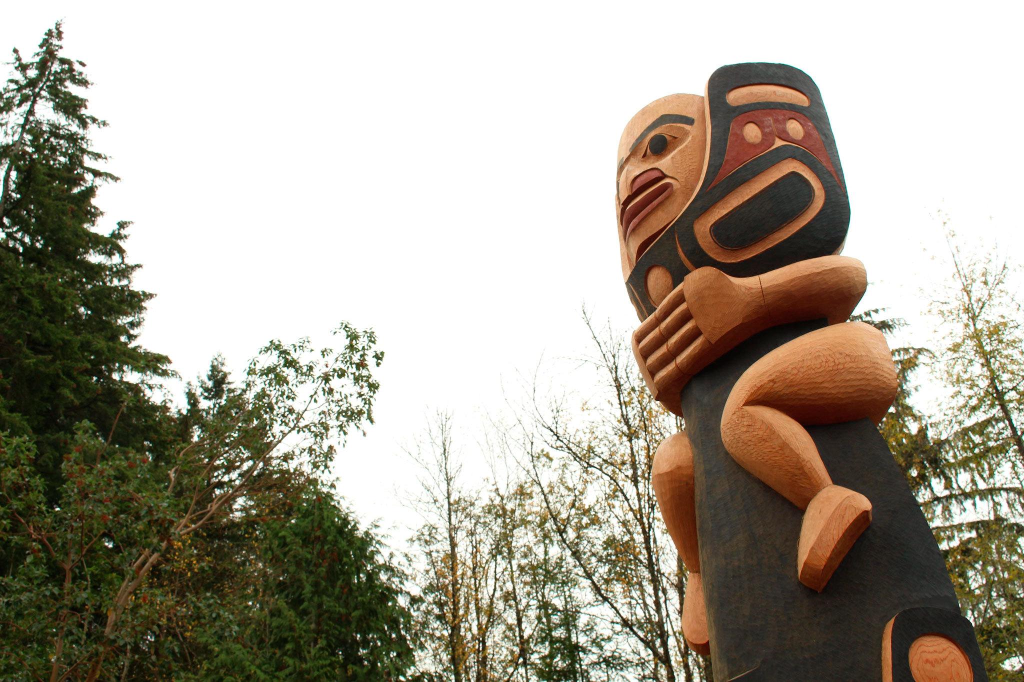 Detail from David Boxley’s “A Tribute to the S’Klallam.” This 12-foot totem depicts a S’Klallam ancestor riding a killer whale atop a thunderbird in human form.   Quinn Brein / Courtesy