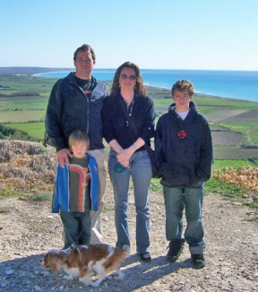 The Wright family in Kourion on the south side of the island beside an ancient amphitheater with the Mediterranean Sea in the background.