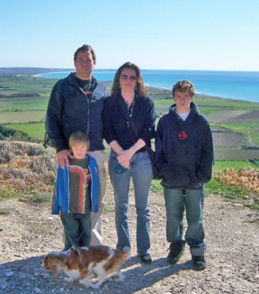 The Wright family in Kourion on the south side of the island beside an ancient amphitheater with the Mediterranean Sea in the background.