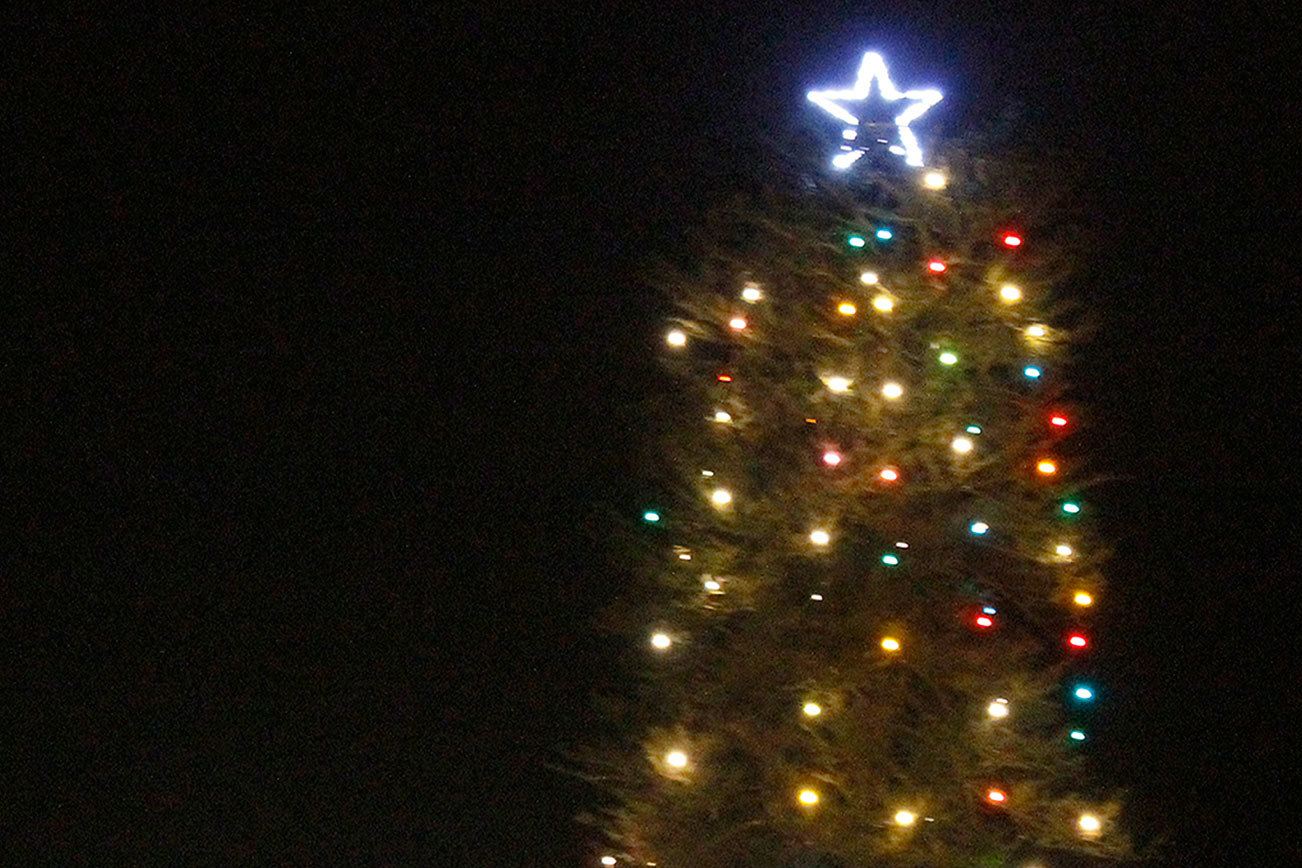 The Silverdale community Christmas tree was lit at 6 p.m. Nov. 26.                                Michelle Beahm / Kitsap News Group