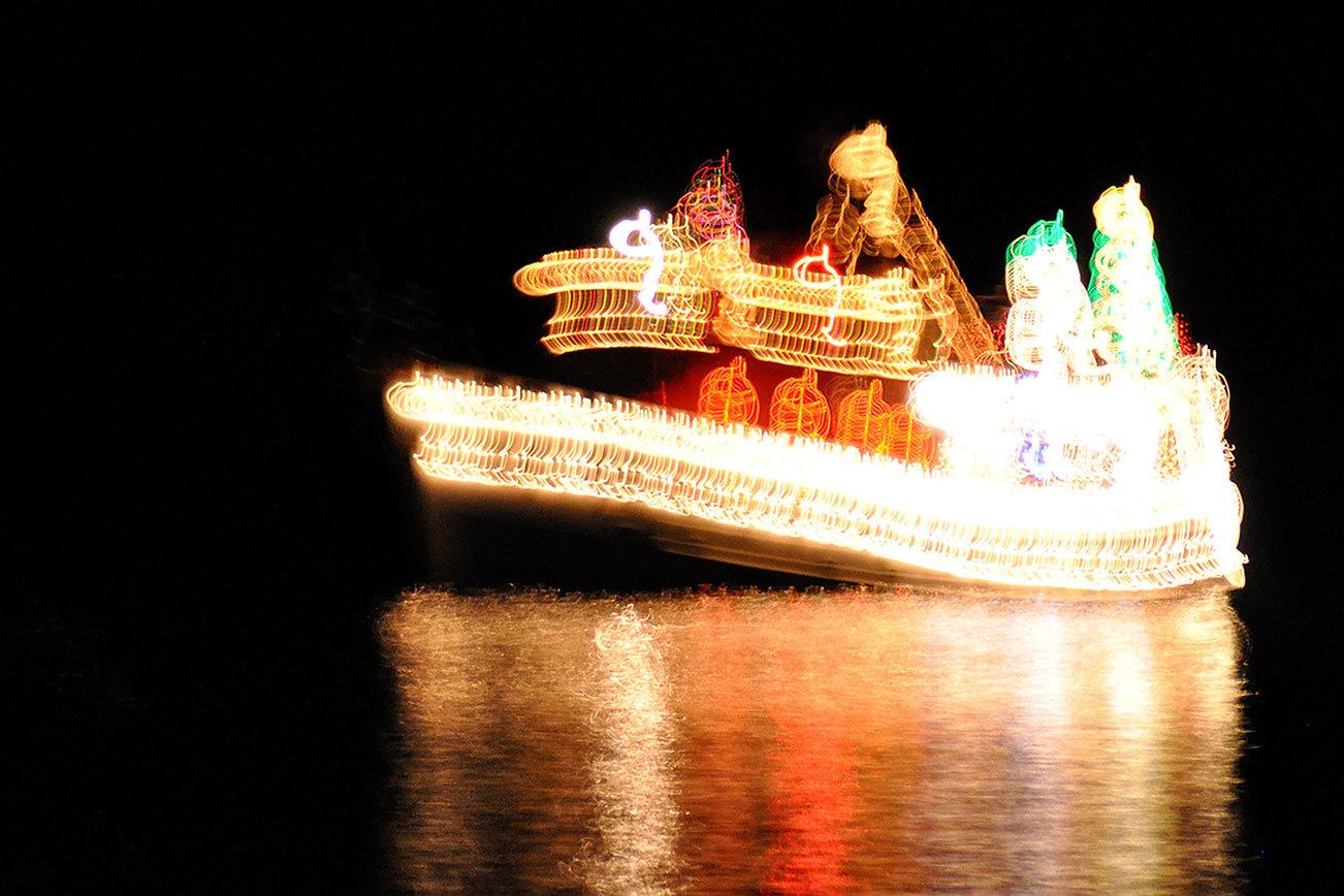 Lighted boat parades bring Christmas cheer to waterfront crowds