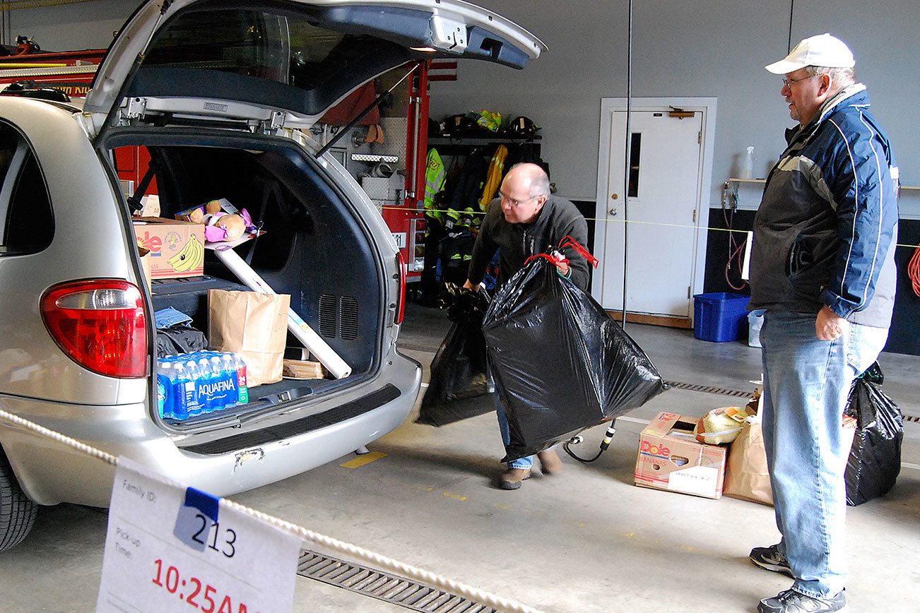 Port Orchard Rotary and Soroptimist International bring Christmas joy to area families, children