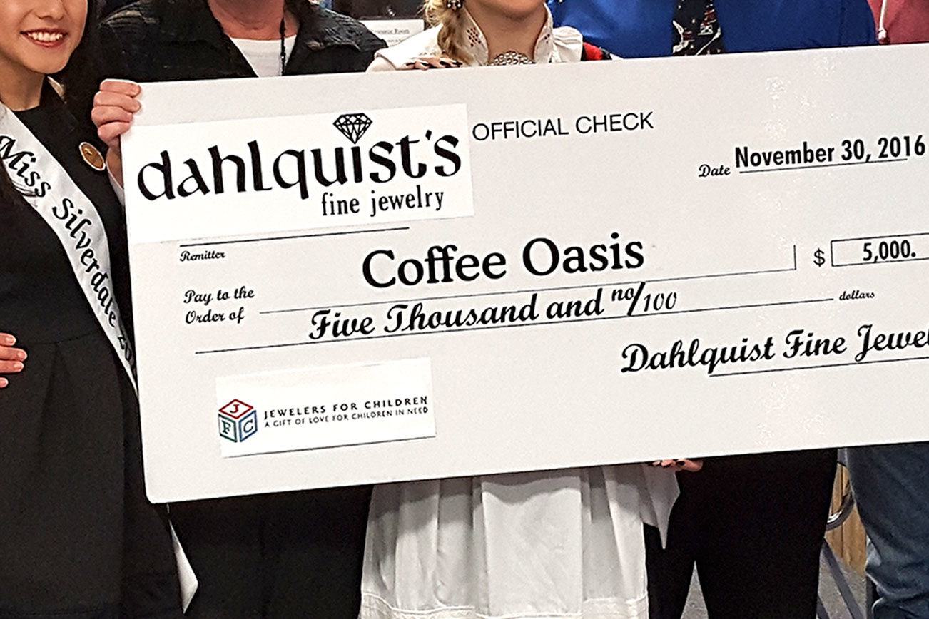 Coffee Oasis receives $5,000 from Jewelers for Children