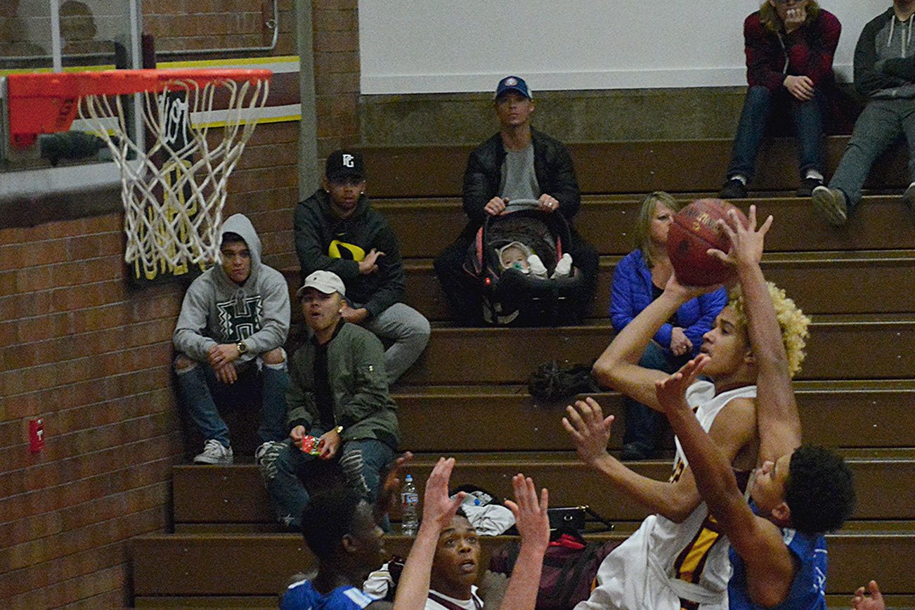 SK basketball loses home opener to Curtis