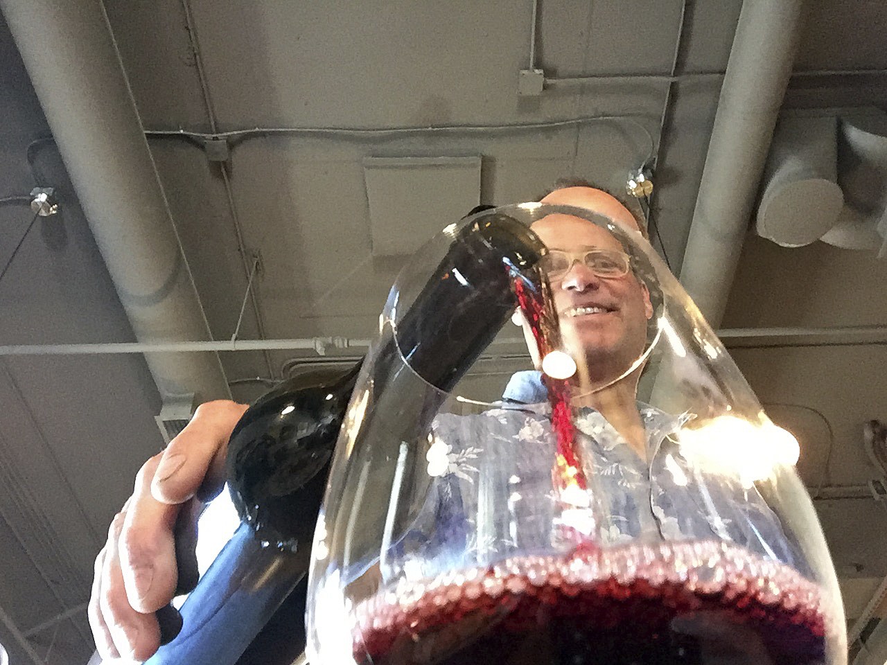 Winemaker Flint Nelson pours a glass of Cabernet Sauvignon from Wit Cellars. Nelson has been a Washington winemaker for 25 years.                                  Andy Perdue / Great Northwest Wine
