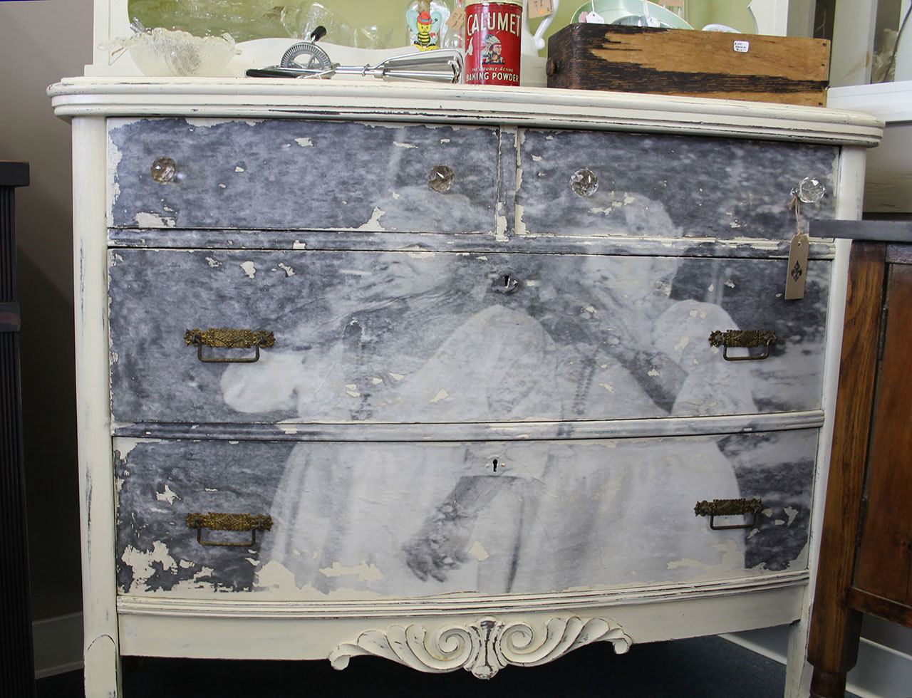 You’ll find antiques, vintage items, and retro items at the Kitsap Antique & Vintage Show, Feb. 25 and 26 at the Kitsap County Fairgrounds. This dresser, which features a lighthearted image of two elderly women smoking, is at Re-Noun, which will have a presence at the show. (Richard Walker/Kitsap News Group)