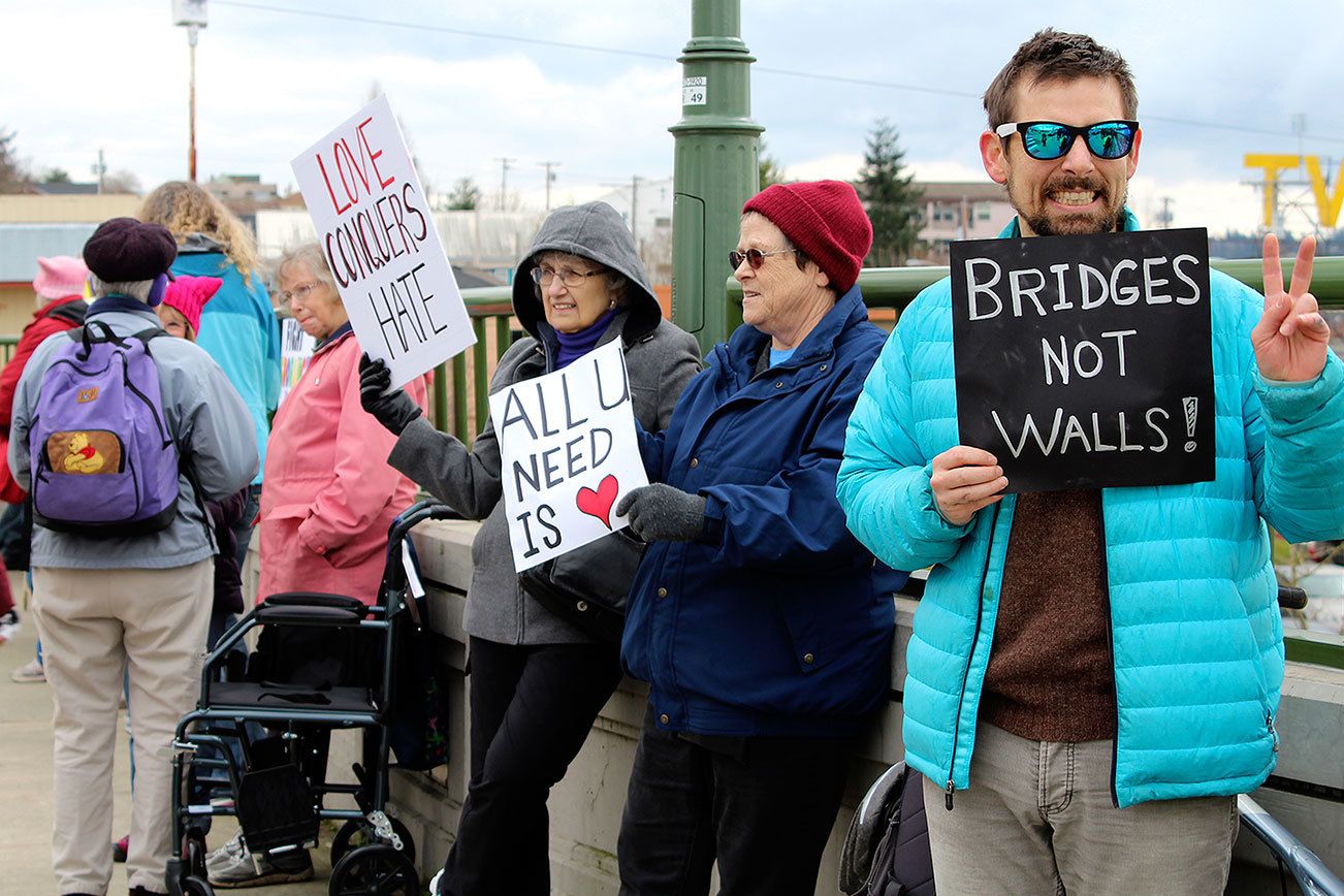 The Manette Bridge was spanned by large crowds of people on Feb. 25 as people from the Kitsap community gathered to show support for incusivity and acceptance, and protest hate and fear.                                Michelle Beahm / Kitsap News Group