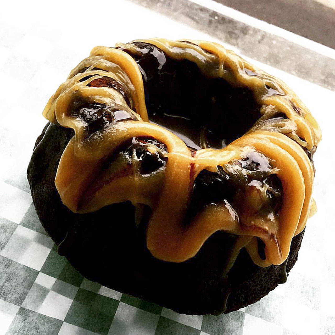 Laughing Dog Kitchen’s chocolate bundt cake with coconut caramel drizzle sells like hot cakes in retail locations.                                Photo courtesy Danielle George / Laughing Dog Kitchen