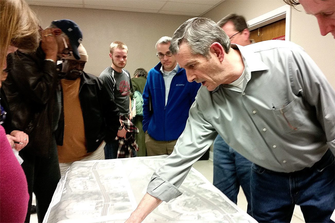 Community members review early plans for the Lebo Boulevard Improvement Project at a meeting Feb. 22, 2016.                                Kitsap News Group file photo