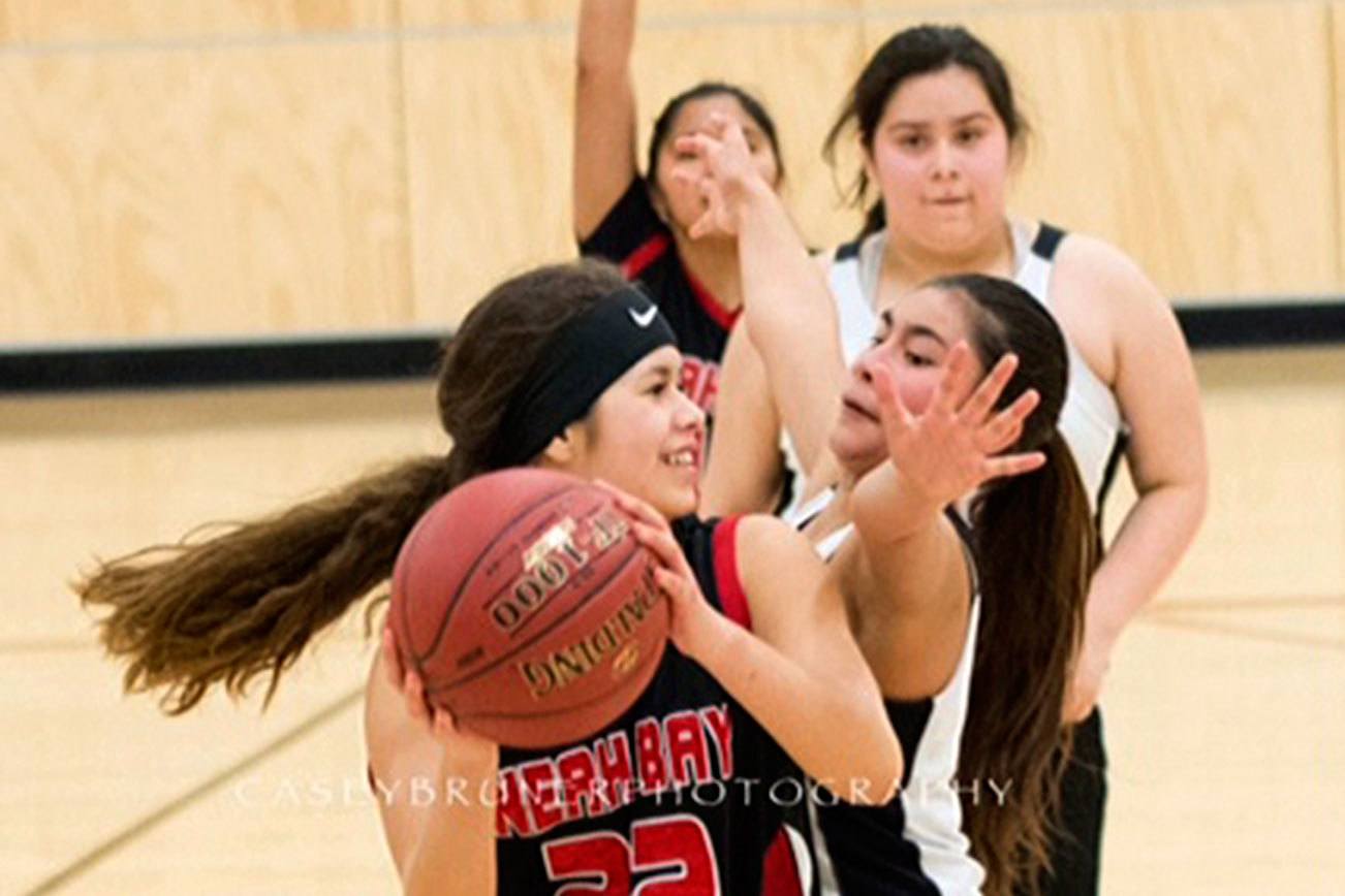 The Bears attempt to gain possession of the ball in their first game of the season, against Taholah, Dec. 2 at the Suquamish Fitness Center. (Casey Bruner / Submitted)