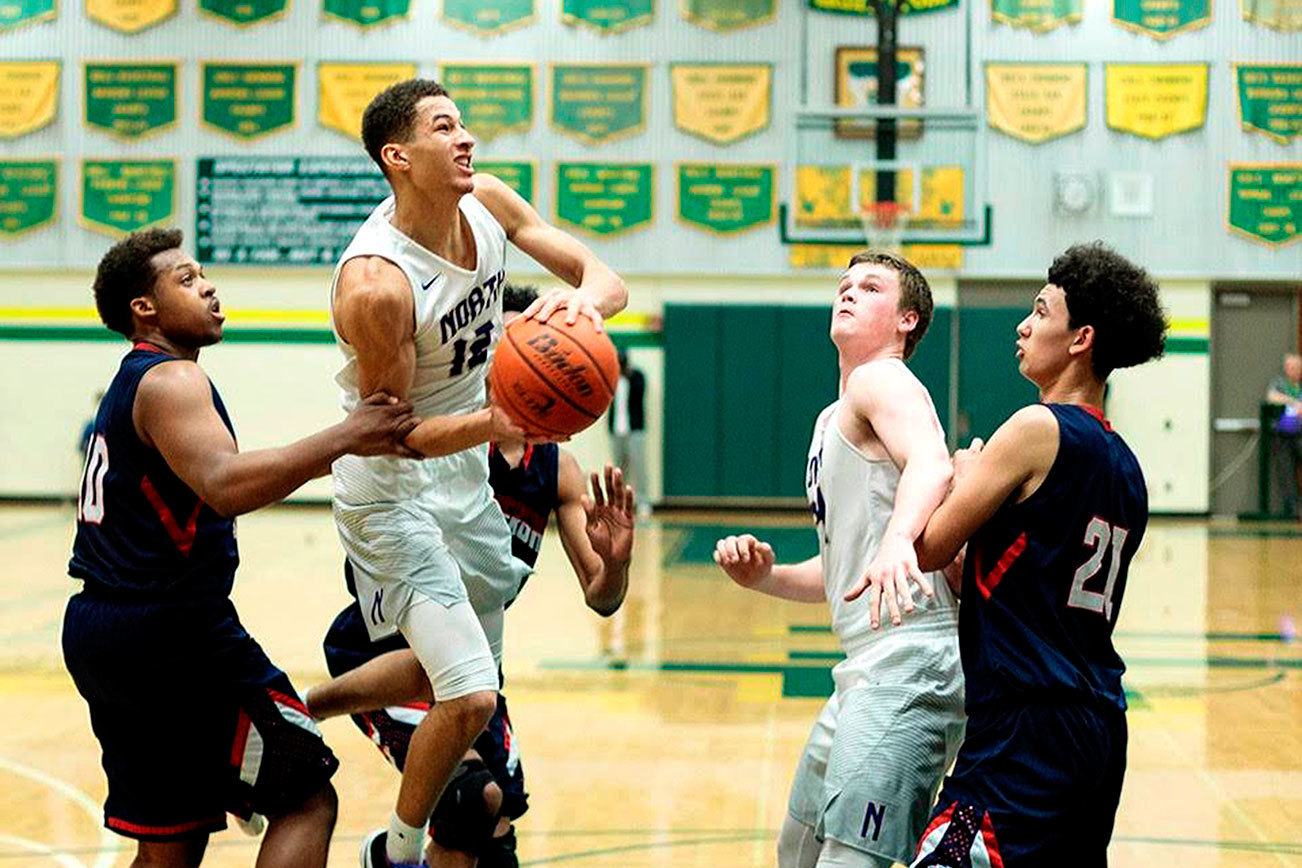 North Kitsap senior Kainen Warren breaks through for a shot during a game against Lindbergh Feb. 15. (Harry McConnell / Contributed)