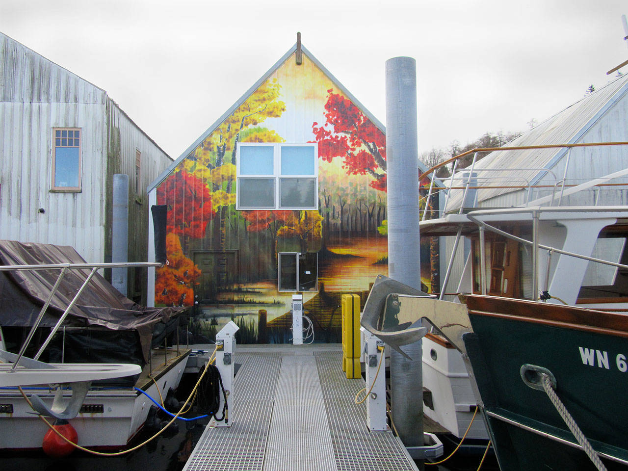 The boathouse at the end of C Dock at the Port of Brownsville sports a colorful mural by local artist Cayla Raymaker.                                Terryl Asla/Kitsap News Group