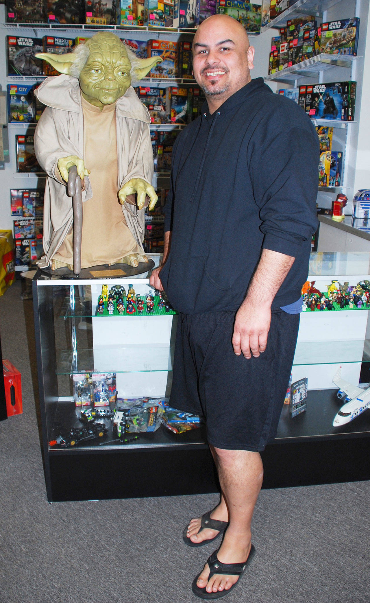 Ben Ramirez says his gaming and collectibles store in Port Orchard has a little bit of everything from popular culture in the ‘80s. Photo credit: Bob Smith | Kitsap Daily News