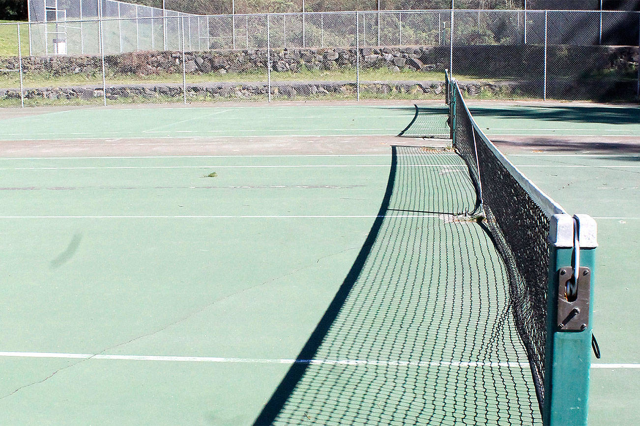 The tennis courts at the Kitsap County Fairgrounds are used by Olympic High School’s tennis program. A recent memorandum of understanding has granted Central Kitsap School District granted continued use, as well as liability and responsibility of renovating and maintaining the courts.                                Michelle Beahm / File photo