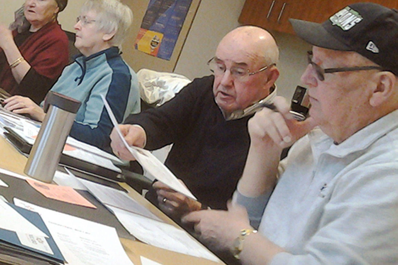 Members of the Poulsbo Historical Society Board of Directors plan all kinds of exciting events at their board meeting, March 3. Among the plans: construction of a boat shed at the maritime museum, a dinner/auction fundraiser, and new exhibits and presentations. (Richard Walker/Kitsap News Group)