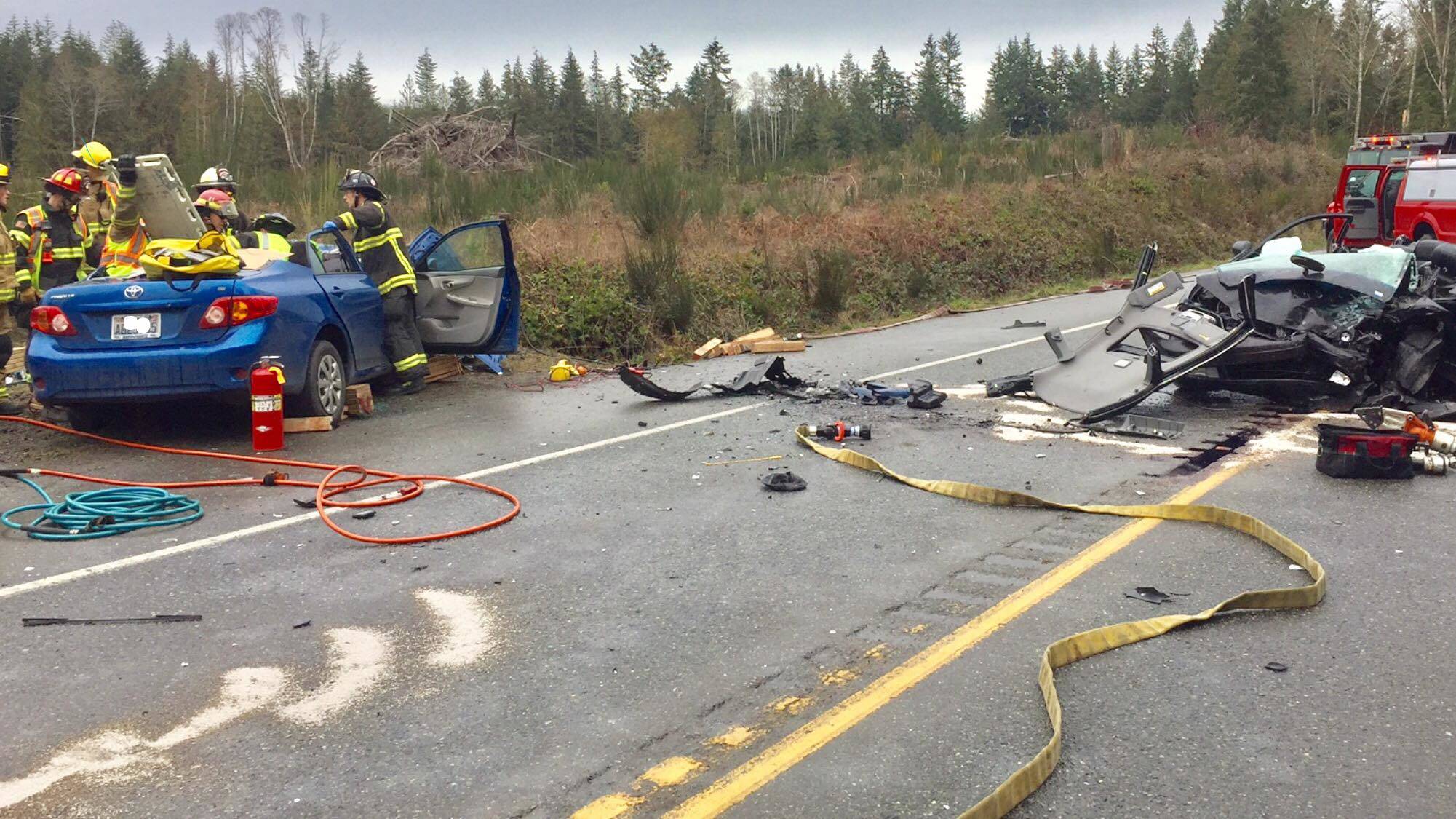 Two motorists were critically injured when their cars collided head-on on Bond Road near Gunderson Road, shortly after 2 p.m. March 12. (Poulsbo Fire Department)