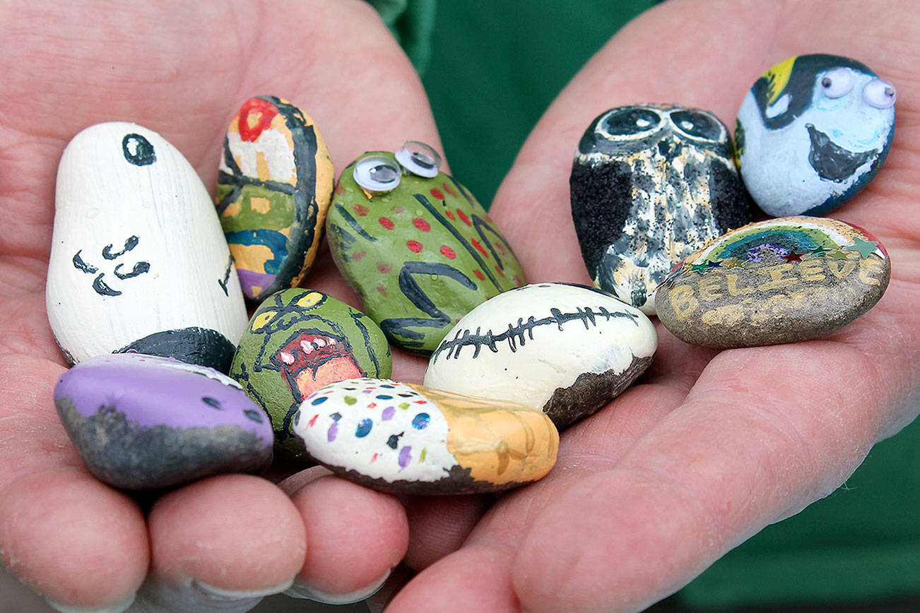 Kitsap Rocks members paint rocks to hide in local parks for others to find. Note: Kitsap Rocks request items such as googly eyes not be attached to the rocks to be hidden outside, since they could be harmful to the environment.                                Michelle Beahm / Kitsap News Group file photo