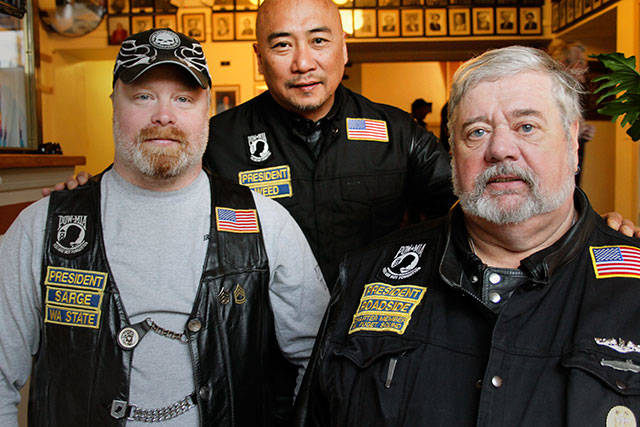 Three presidents of the Brothers in Arms Motorcycle Club attended the community kickoff. From left, Jonni “Weed” Oben, state president; Chris “Sarge” Sargent, national president; Gary “Roadside” Coykendall, West Puget Sound Chapter president. (Terryl Asla/ Kitsap News Group)