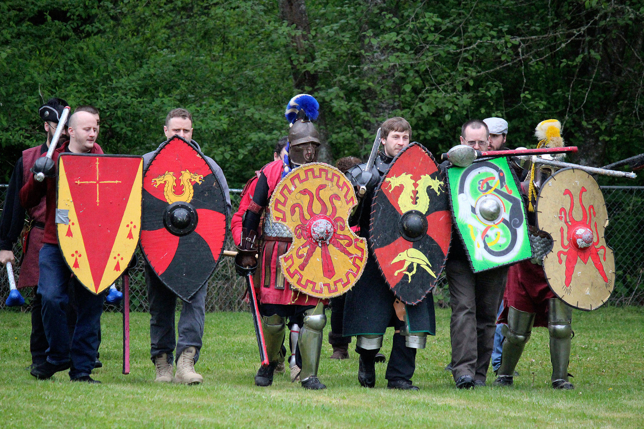 Dragon’s Lair fighters with the Kingdom of An Tir run through war drills in preparation for large-scale melee battles.                                Michelle Beahm / Kitsap News Group