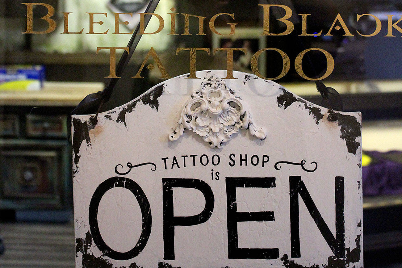 Bleeding Black Tattoo, owned by artist Nik Flores, is open 11 a.m. to 9 p.m. daily in Old Town Silverdale. Bleeding Black specializes in custom tattoos of any style.                                Michelle Beahm / Kitsap News Group