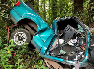 Kitsap County Sheriff’s traffic deputies are investigating the death of the driver of a truck that crashed on the Port Madison Indian Reservation at 9 a.m. June 3. (Kitsap County Sheriff’s Office)
