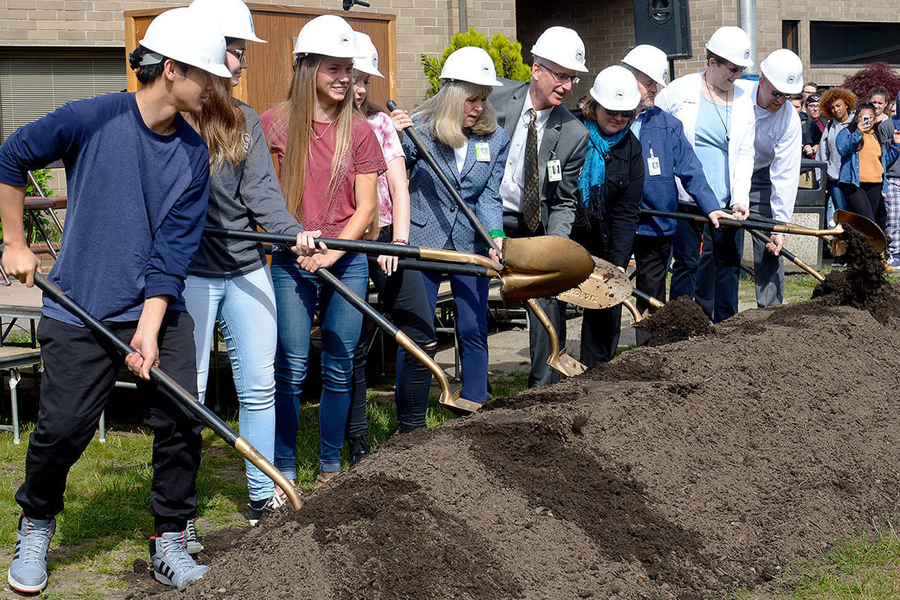 The ceremonial shovel turning May 31 signifies the official groundbreaking of the Olympic High School construction project.                                Photo courtesy Central Kitsap School District
