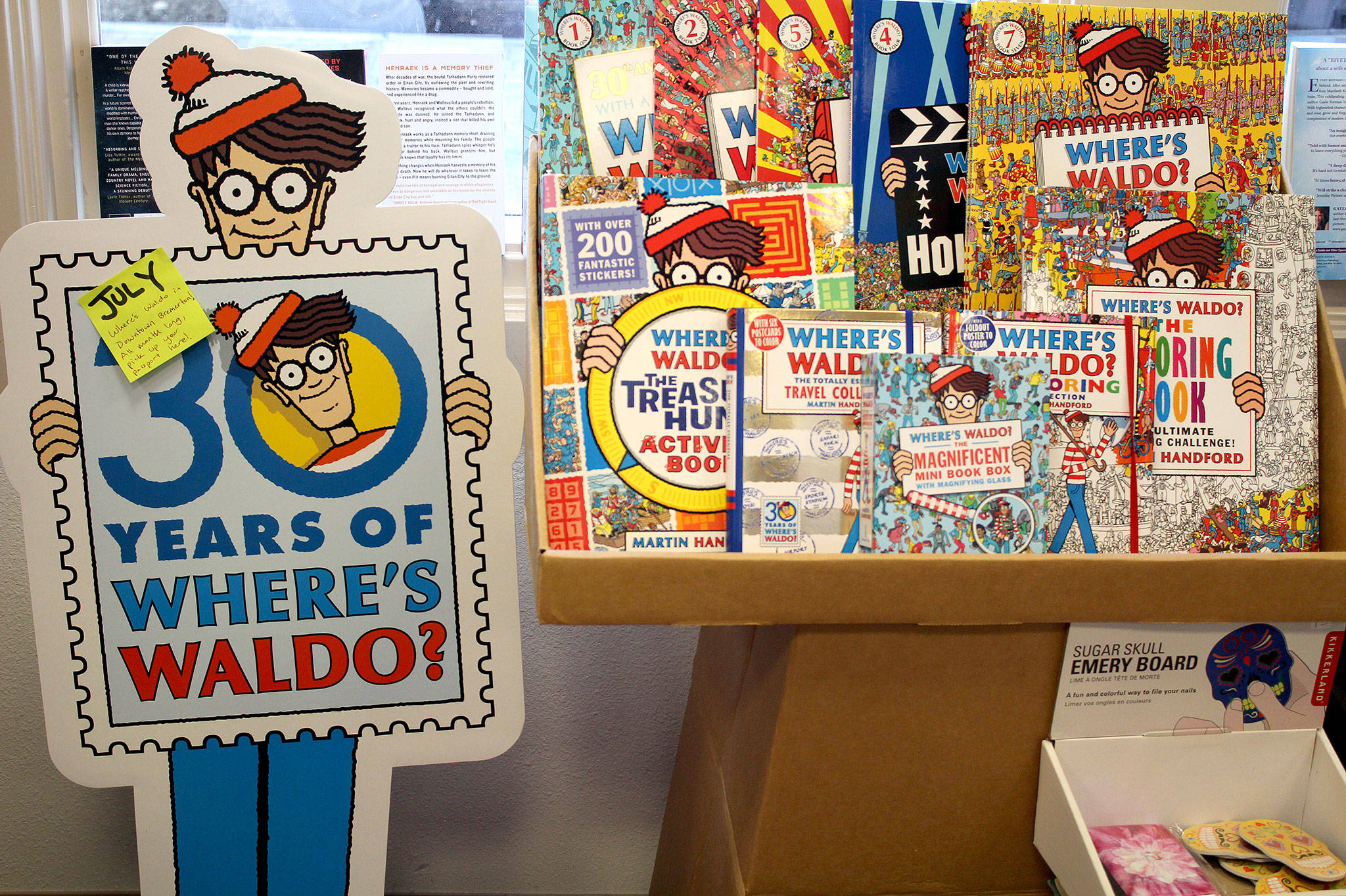 “Where’s Waldo?” publishers Candlewick Press send merchandise to participating bookstores so they can set up a local scavenger hunt. Liberty Bay Books has set up two different scavenger hunts, one in Bremerton with 25 businesses, and one in Poulsbo with 35. Participants who find enough Waldos will be given prizes and be invited to a celebratory pizza party on July 31.                                Michelle Beahm / Kitsap News Group