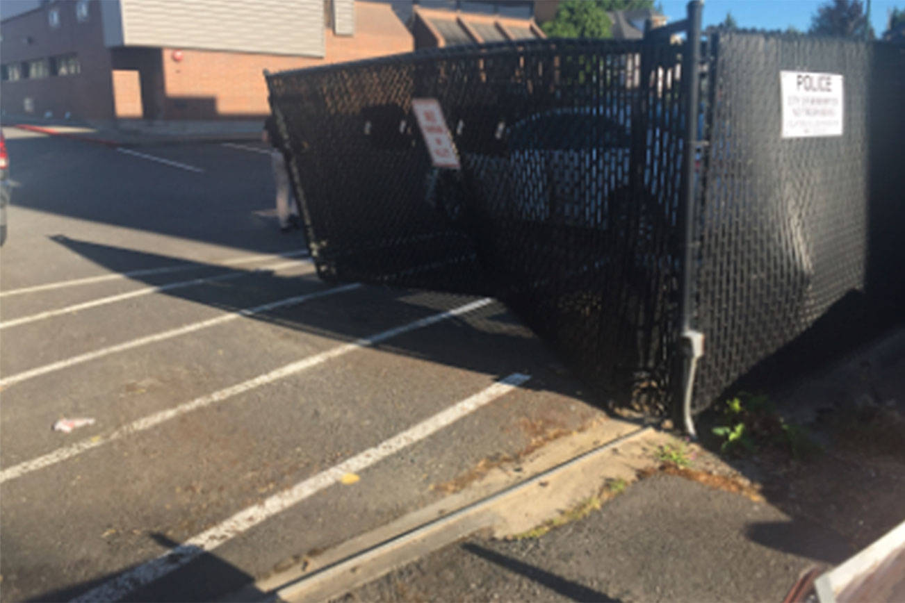 In the early morning of June 22, the driver of a stolen vehicle crashed through this security gate at the Bremerton Police Department parking lot. He crashed through a second gate in an effort to flee the scene and then crashed again several blocks away and, finally, fled on foot. The suspect is in custody.                                Bremerton Police Department/courtesy
